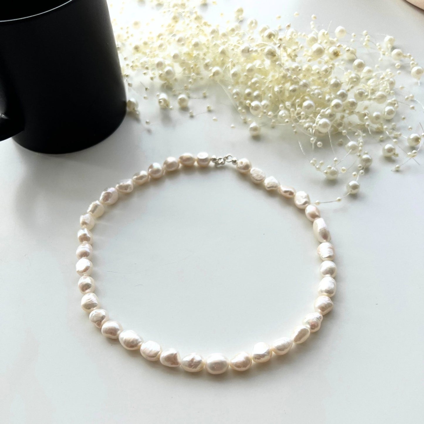 Sena Chunky Freshwater Pearl Necklace on background with cup- KORYANGS Brand